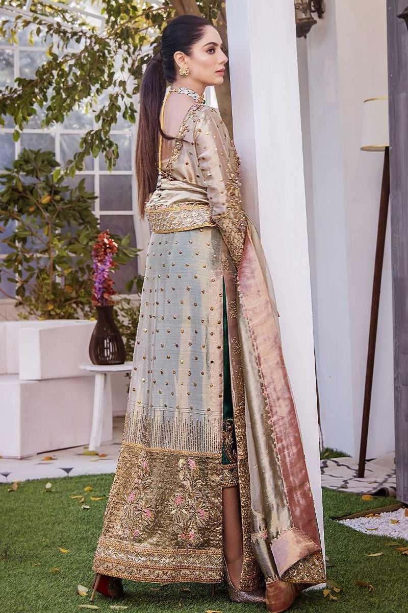 Noor- e- Samar pakistani fashion outfit in gold, green tones.